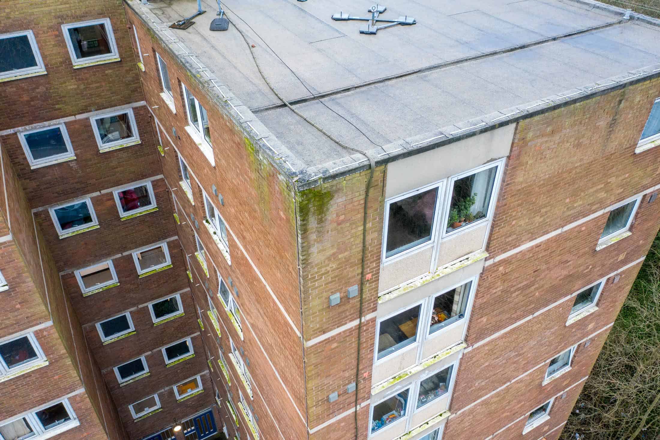 Aerial view of tower block for aerial roof inspection